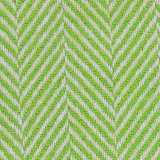 Close-up texture detail of a lime green herringbone recycled wool blanket showing the woven herringbone pattern and soft wool fibers