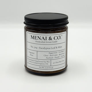 soy candle No. 704 Eucalyptus Leaf and Mint amber jar white background centered
